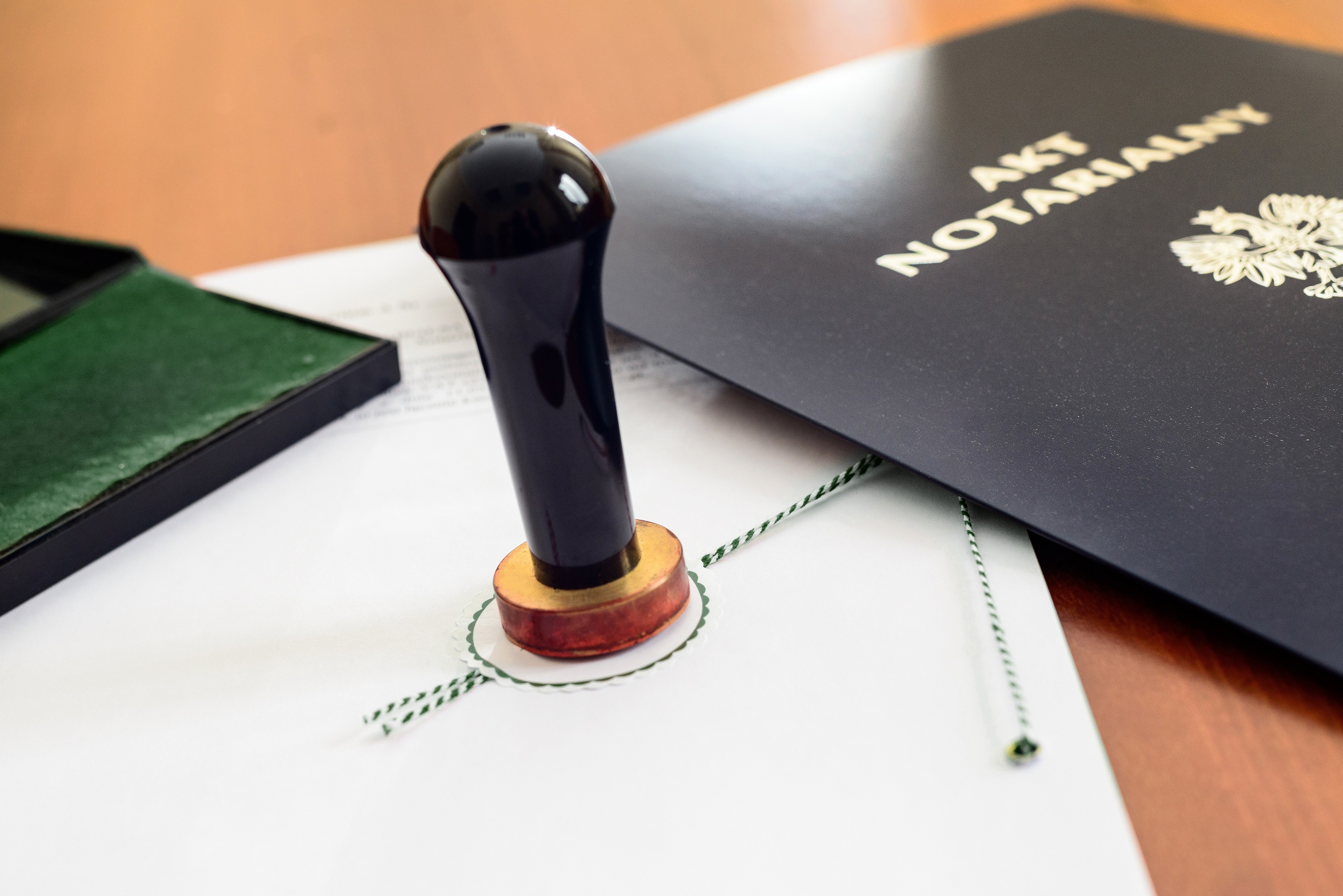 Close-up photo of a bookshelf with old books.